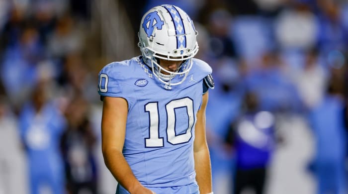 UNC quarterback Drake Maye hangs his head during loss to Virginia